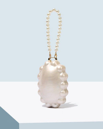 Oceana Pearl Clutch – Sculpted Pearl Mini Bag with Beaded Handle, Elegant Resort & Evening Accessory